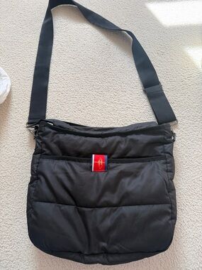 Black Quilted Crossbody Bag with Red Logo Accent